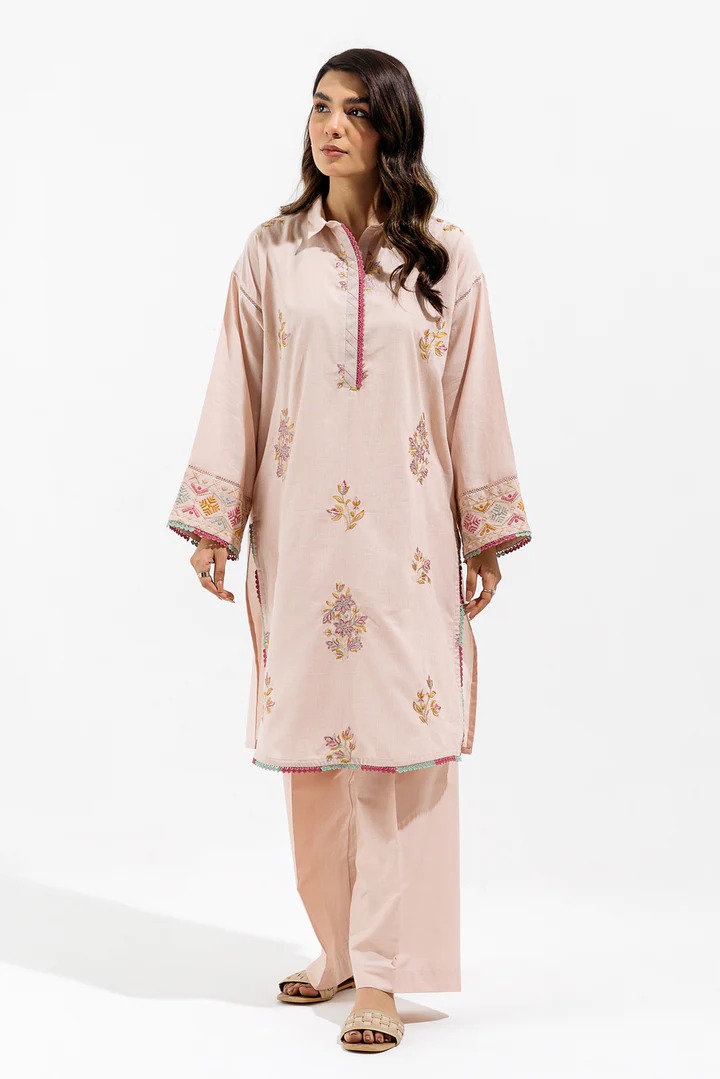 This is our gorgeous pink embroidered kurta suit made with the highest quality of high-end cotton fabric. With its bright pink shade, this kurta effortlessly blends elegance and style and is a must-have as a part of your ethnic collection. Take pleasure in the timeless beauty of workmanship and enjoy the elegance that is our delicately embroidered pink suits designed to highlight your style.